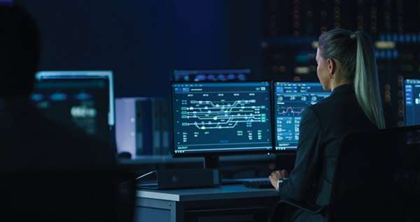 24/7 security operations center with analysts monitoring managed detection and response dashboards