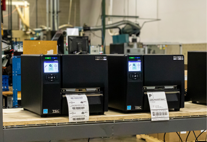 Fleet of TSC industrial RFID printers staged in a TRG configuration facility