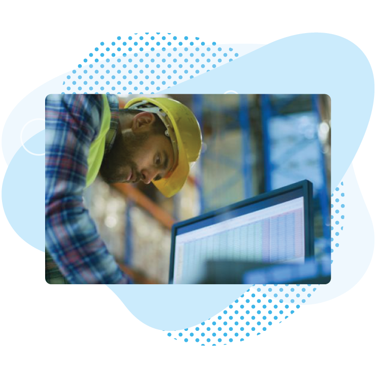 man looking at computer for data warehouse optimization