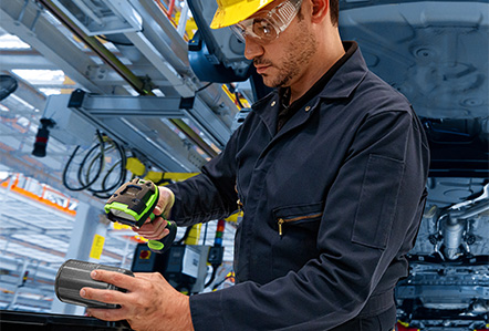 Tablet device mounted at the end of a manufacturing production line